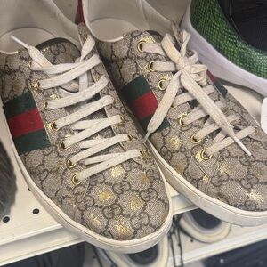 Gucci Beige Sneakers with Gold and Red-Green Stripes